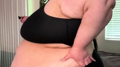 Busty curly brunette with big boobs fucks on couch