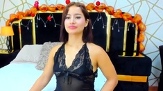 Busty babe in sexy black lingerie masturbating