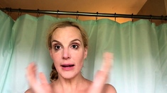 Busty amateur milf masturbates in the shower