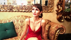 Busty babe playing with her big boobs