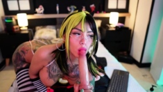 Big boobed Memphis masturbates in a bodystocking